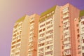 Multi-storey house with lots of windows, balconies and air conditioning. Detail photo of old skyscraper in Russia and Ukrain Royalty Free Stock Photo