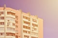 Multi-storey house with lots of windows, balconies and air conditioning. Detail photo of old skyscraper in Russia and Ukrain Royalty Free Stock Photo