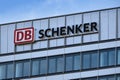 multi-storey modern building featuring with DB Schenker logo, division of German rail operator Deutsche Bahn focuses on