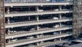 Multi-story car park building with cars