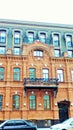 Multi-story house yellow white color with a circular panoramic Windows and balconies modern architecture Royalty Free Stock Photo