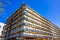 Multi Story Residential Building Under Construction With Scaffolding