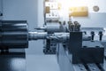 The multi-tasking CNC lathe machine swiss type tapping at the brass shaft .