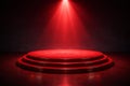 Multi-tiered red podium illuminated by a single red spotlight Royalty Free Stock Photo