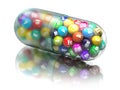 Multi vtamin complex with different elements in capsule or pill.  Dietary supplement and healthy lifestyle eating concept Royalty Free Stock Photo