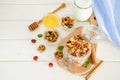 Multicereal homemade organic granola with a mixture of nuts, dried cherries, honey, cinnamon  and yogurt Royalty Free Stock Photo