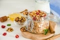 Multicereal homemade organic granola with a mixture of nuts, dried cherries, honey, cinnamon  and yogurt Royalty Free Stock Photo