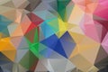 Multicolor background of triangles. Bright color.