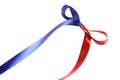 Multicolor blue-red fabric ribbon and bow on white background Royalty Free Stock Photo