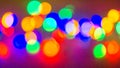 Multicolor Blurry christmas lights on a Black background