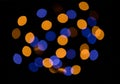 Multicolor bokeh light circles on neutral gray background Royalty Free Stock Photo