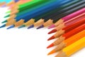 Bright color pencils diagonal wave on white background with red pencil on focus Royalty Free Stock Photo