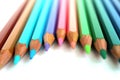 Bright color pencils horizontal wave on white background with pink central pencil on focus Royalty Free Stock Photo