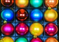 Multicolor Christmas balls in a row