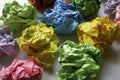 Multicolor crumpled balls over a white background Royalty Free Stock Photo