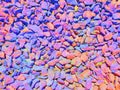 Multicolor crushed stone: red, green, blue color, background, texture Royalty Free Stock Photo