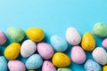 Multicolor Easter eggs on blue background Royalty Free Stock Photo