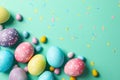 Multicolor Easter eggs on mint background Royalty Free Stock Photo