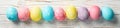 Multicolor Easter eggs on rustic background, space for text Royalty Free Stock Photo