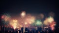 Multicolor fireworks explosion in night sky. Defocused night city.