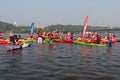 Multicolor kayakers on the river