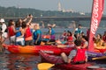 Multicolor kayakers on the river