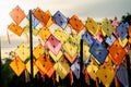 Multicolor kites are set or hang on rope and pole with morning light in concept of bright future with clear sky Royalty Free Stock Photo