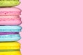 Multicolor macaron on pastel pink color background,copy space Royalty Free Stock Photo