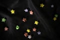 Multicolor origami stars on back satin