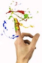 Multicolor paint circulating around forefinger Royalty Free Stock Photo