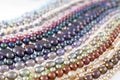 Multicolor Pearl Strands in parallel waves backlit composition Royalty Free Stock Photo