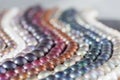 Multicolor Pearl Strands in parallel waves composition Royalty Free Stock Photo