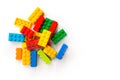 Lego background. Bunch of Multicolor Plastick constructor bricks on white background. Popular toys. Copyspace