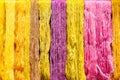 Multicolor of raw silk threads are hanging after dyed color. Royalty Free Stock Photo