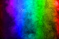 Multicolor smoke on black background