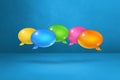 Multicolor speech bubbles on blue background Royalty Free Stock Photo
