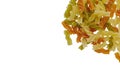 Multicolor spiral pasta on the white background Royalty Free Stock Photo