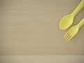 Plastic spoon and fork, bright color Royalty Free Stock Photo