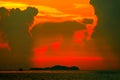 multicolor of sunset cloud on silhouette sky fishing boat on island sea