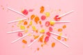 Multicolor sweet lollipops bitten pieces set on pink background Royalty Free Stock Photo