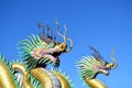 Multicolor of two Chinese dragon statues against blue sky Royalty Free Stock Photo