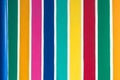 Multicolor vertical striped pattern on cement wall. Colorful painted on cement surface of the wall. Graffiti in the colors of Royalty Free Stock Photo