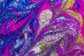 Luxury abstract background of glitter paint swirls