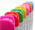 Multicolored aerosol cans Royalty Free Stock Photo