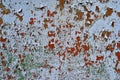 Multicolored background: rusty metal surface with blue paint flaking and cracking texture Royalty Free Stock Photo