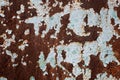 Multicolored background: rusty metal surface with blue paint flaking and cracking texture Royalty Free Stock Photo