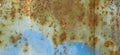 Multicolored background. Rusty metal surface with blue paint flaking and cracking texture Royalty Free Stock Photo