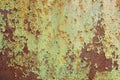 Multicolored background, rusty metal surface with green paint flaking and cracking texture. Royalty Free Stock Photo