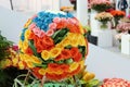 Multicolored ball shaped bouquet of roses in hall