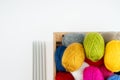 Multicolored balls of wool knitting yarn in the box isolated on white background Royalty Free Stock Photo